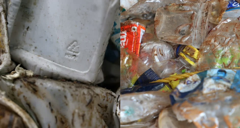Close-up of a soil-stained HDPE container with a recycling symbol beside crushed, dirty plastic packaging